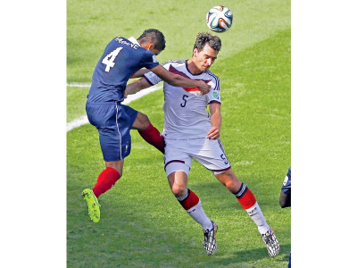 hummels heads germany into world cup semis