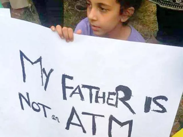 parents protested with their children against the high handedness of private schools in islamabad photo express parents protested with their children against the high handedness of private schools in islamabad photo express