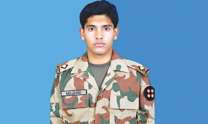 martyred in bajaur army captain laid to rest