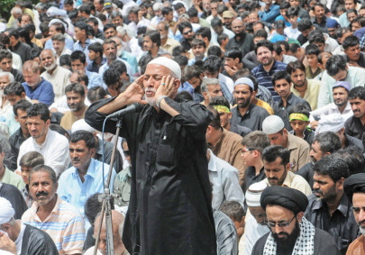 paying tribute procession to mark youm e ali ends peacefully