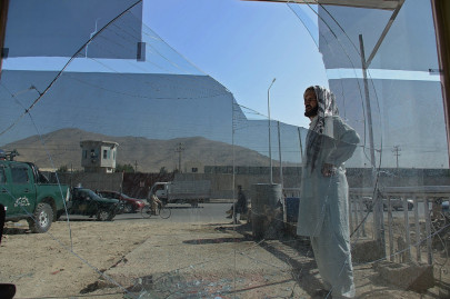 taliban attack kills four foreigners in kabul compound police