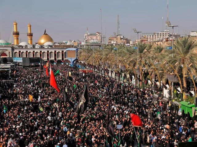 shia pilgrims gathering in front of the shrine of imam hussein ra photo afp