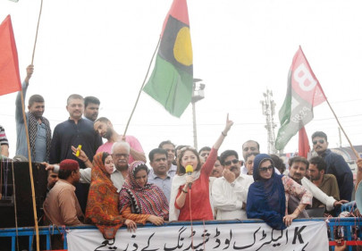 mpas stage sit in outside k electric office denounce power outages