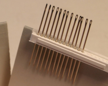 illinois man charged with putting needles in store meat