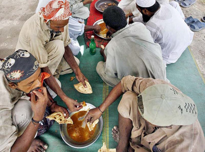 pakistanis spend nearly half of their income on food report pakistanis spend nearly half of their income on food report