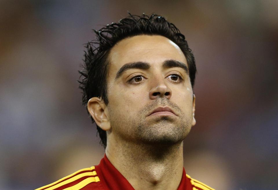 xavi calls time on spain career