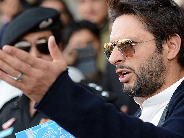 shahid afridi gestures while speaking at a ceremony in peshawar photo afp