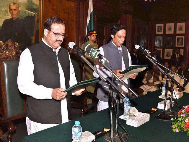 sardar usman buzdar is administered oath by acting governor punjab assembly speaker pervaiz elahi at the governor house in lahore on monday photo app