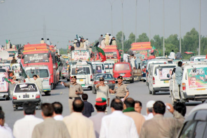 all roads lead to cm khattak leads azadi march caravan to islamabad