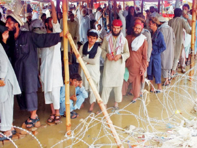 dual addresses displaced families of minorities from waziristan scramble for rations in bannu