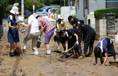 rescuers comb through devastation of japan landslide