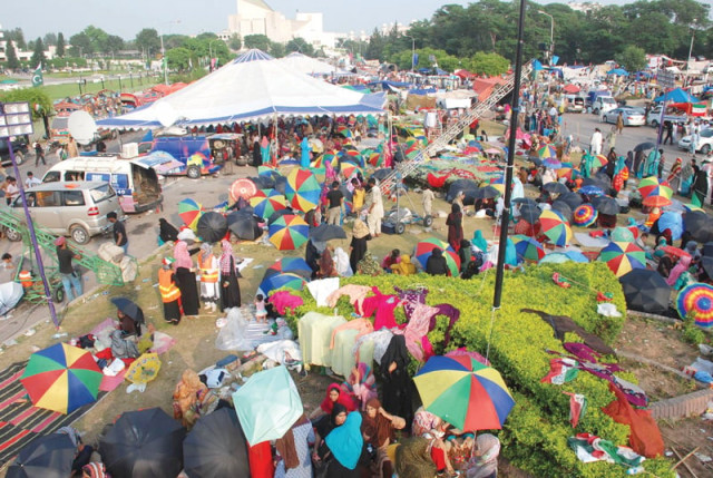 high sales at sit ins umbrella vendors singing in the rain high sales at sit ins umbrella vendors singing in the rain