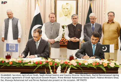 pm witnesses signing of dasu hydropower project