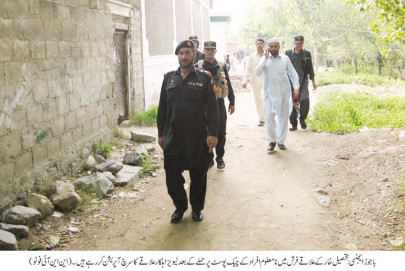 under cover of darkness two levies officials injured in grenade attack