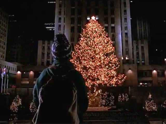 beautiful ornaments of all colours covered the tree and glittered under the dim light of the tiny fairy lights which twinkled in warm shades of yellow red and green photo twentieth century fox