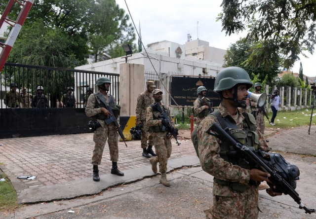 army secure ptv headquarters after protesters storm building army secure ptv headquarters after protesters storm building