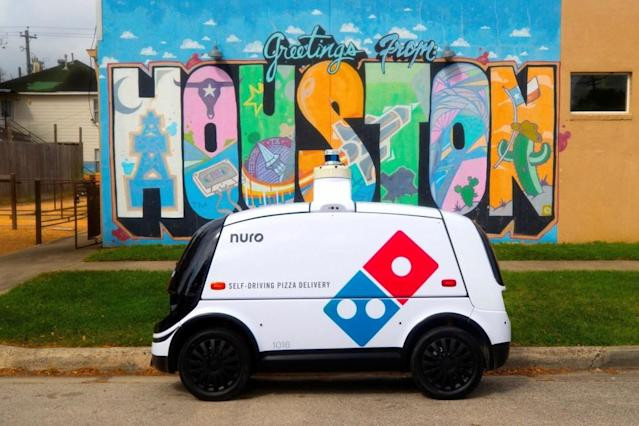 domino s and nuro are launching autonomous pizza delivery in houston beginning this week photo afp