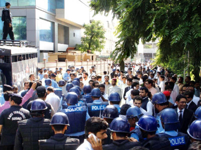 gloves are off hundreds detained as police swoop on pti workers