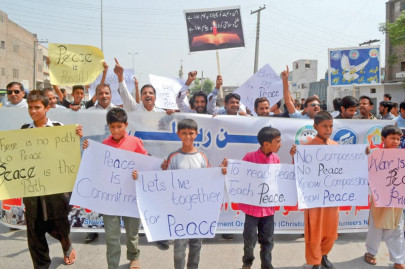 a year on peace walk held in memory of all saints church blasts victims