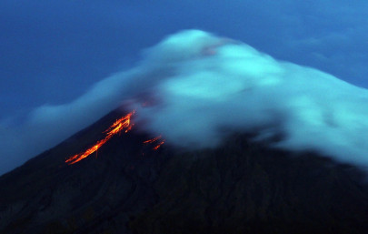 rushed evacuations as philippine volcano spews lava