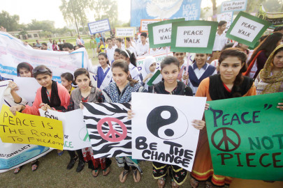 international peace day hundreds walk for peace at racecourse park