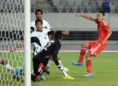 asian games china edge out pakistan to reach men s football knockouts