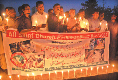 amid cries of discrimination peshawar church blast victims remembered