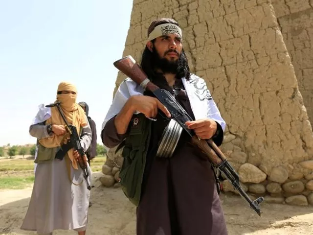 taliban walk as they celebrate ceasefire in ghanikhel district of nangarhar province afghanistan on june 16 2018 photo reuters taliban walk as they celebrate ceasefire in ghanikhel district of nangarhar province afghanistan on june 16 2018 photo reuters
