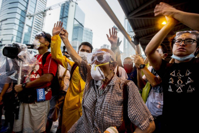 hong kong protesters defiant after tear gas chaos