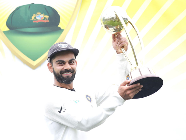 virat kohli poses with the bordergavaskar trophy as he celebrates india 039 s 2 1 series win after day five of the fourth test match in the series between australia and india at sydney cricket ground on january 07 2019 in sydney australia photo getty