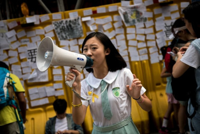 china detains activists for supporting hong kong protests rights groups