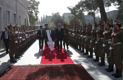 british pm cameron arrives in afghanistan to meet unity govt