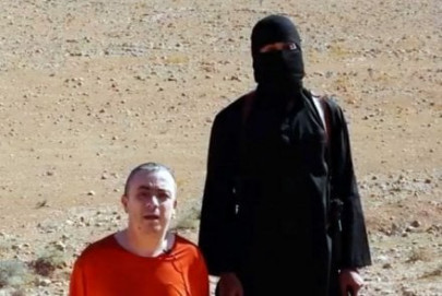 is claims murder of british hostage in latest video