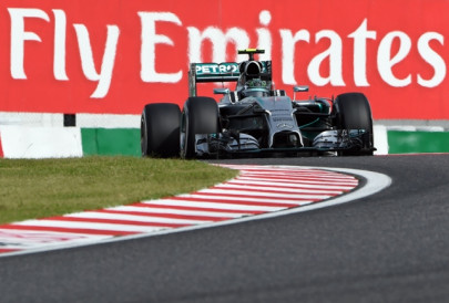 rosberg roars to pole at japan