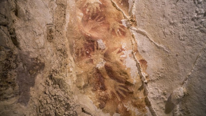 indonesian cave paintings challenge europe as cradle of art