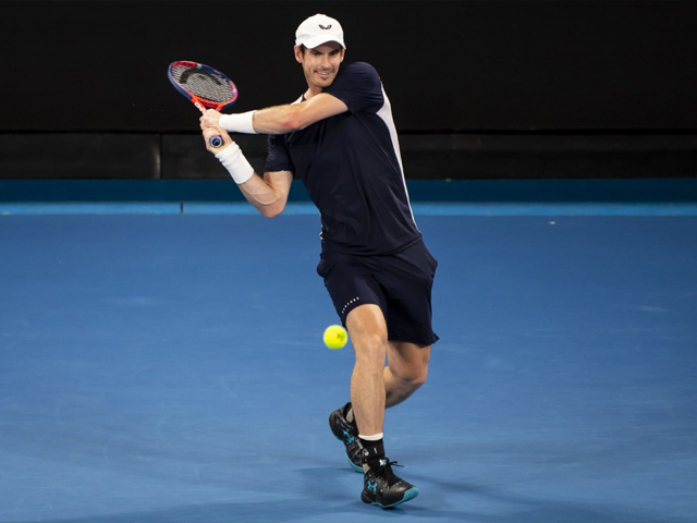 andy murray of great britain hits a backhand in his first round match against roberto bautista agut of spain during day one of the 2019 australian open at melbourne park on january 14 2019 in melbourne australia photo getty