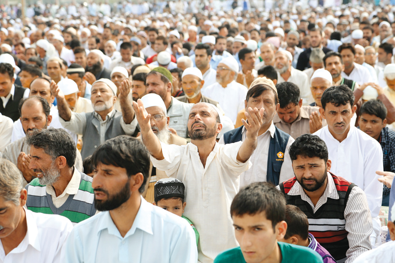 austere celebrations under curfew people in srinagar mark eid with simplicity