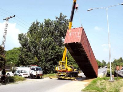 islamabad administration removes containers in federal capital