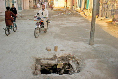 watch your step hundreds of manholes lie uncovered in city