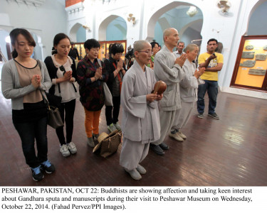 common heritage south korean monks step through peshawar s window to gandhara