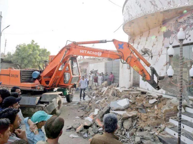 the anti encroachment operations continue at lucknow society in korangi where stairs in front of a wedding hall are being demolished photo ppi the anti encroachment operations continue at lucknow society in korangi where stairs in front of a wedding hall are being demolished photo ppi