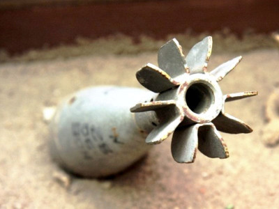 unknown direction minor injured by mortar shell