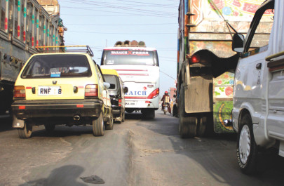 bumpy thoroughfare potholes make traversing ijp road a nightmare