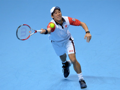 nishikori overcomes nerves to win tour finals opener