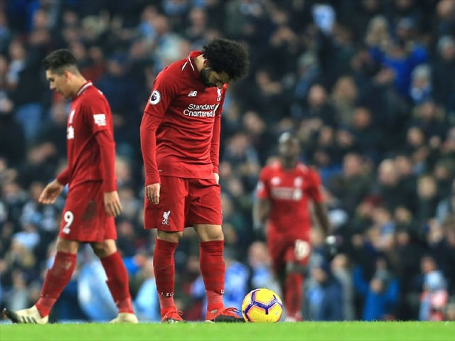mohamed salah of liverpool and his team look dejected during the premier league match between manchester city and liverpool fc at the etihad stadium on january 3 2019 in manchester united kingdom photo getty