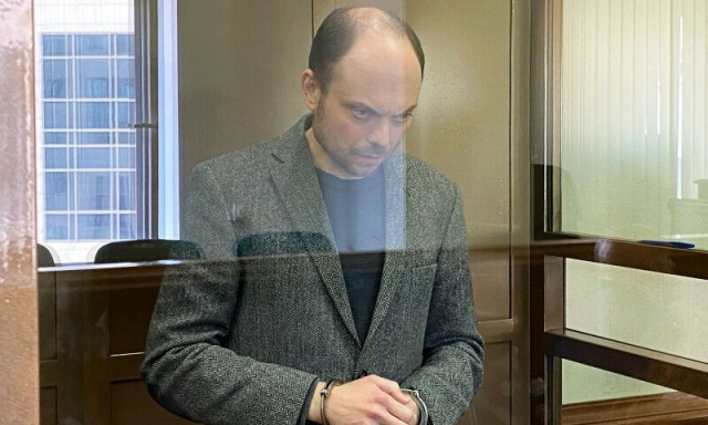 russian opposition figure vladimir kara murza who is accused of treason and spreading false information about the russian army stands inside a defendants cage during his sentencing at the moscow city court in moscow on april 17 2023 photo afp russian opposition figure vladimir kara murza who is accused of treason and spreading false information about the russian army stands inside a defendants cage during his sentencing at the moscow city court in moscow on april 17 2023 photo afp