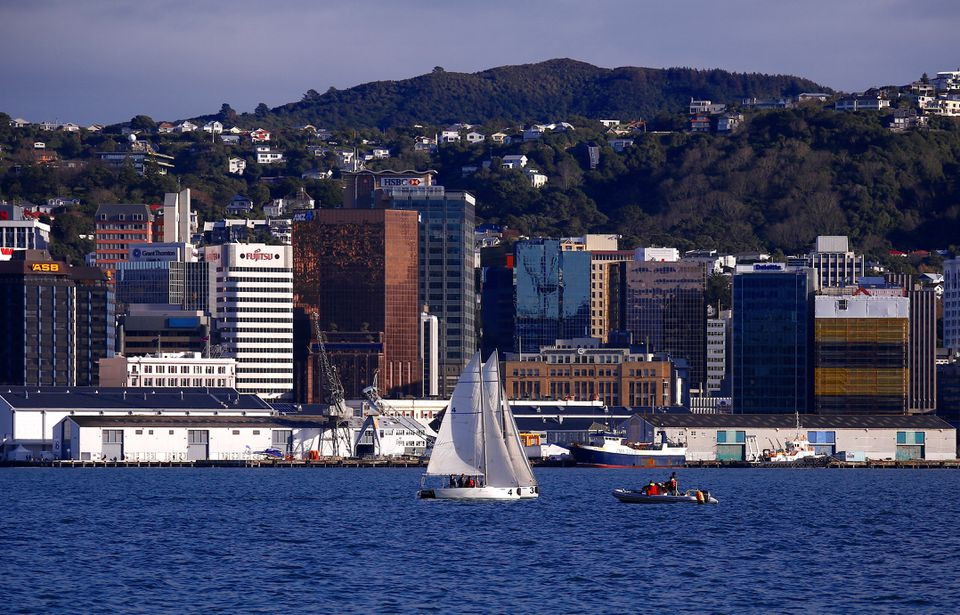 a sailing boat can be seen in front of the central business district cbd of wellington in new zealand july 2 2017 reuters