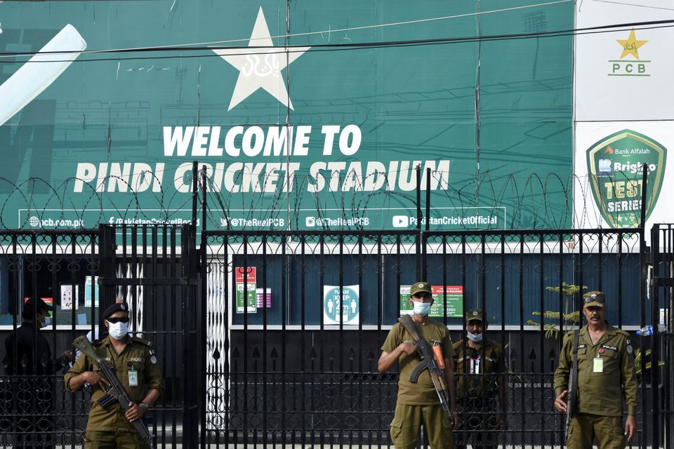 police officers stand guard outside rawalpindi cricket stadium after new zealand cricket team pull out of a pakistan cricket tour over security concerns in rawalpindi pakistan september 17 2021 photo reuters