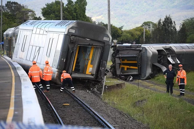 a derailed passenger train is seen after it hit a car on a level crossing in kembla grange australia october 20 2021 photo reuters a derailed passenger train is seen after it hit a car on a level crossing in kembla grange australia october 20 2021 photo reuters
