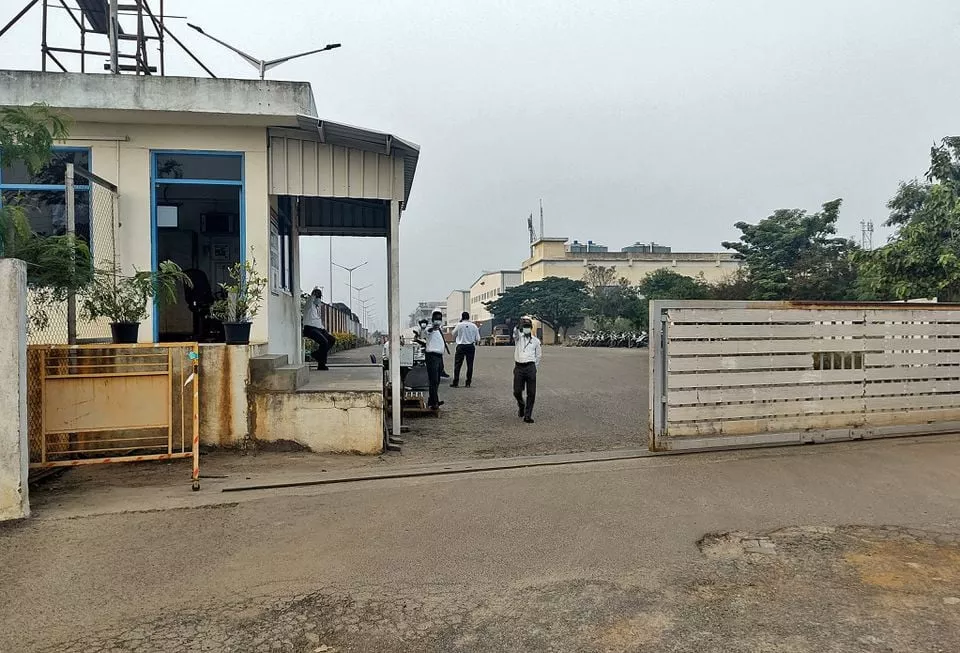 private security guards stand at the entrance of a closed plant of foxconn india which makes iphones for apple inc near chennai india december 22 2021 picture taken december 22 2021 reuters private security guards stand at the entrance of a closed plant of foxconn india which makes iphones for apple inc near chennai india december 22 2021 picture taken december 22 2021 reuters
